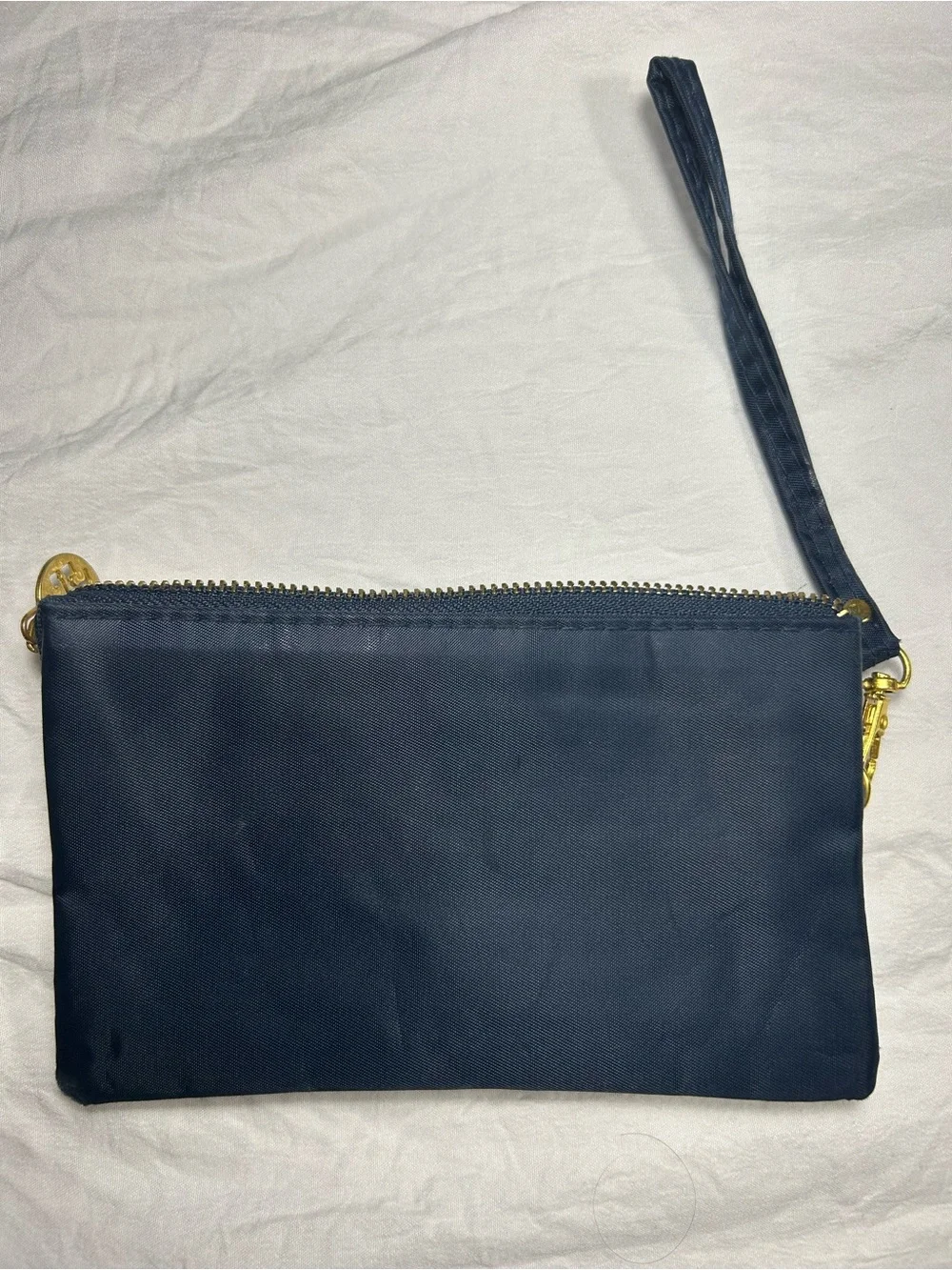 Tory Burch Navy Wristlet with Gold Emblem